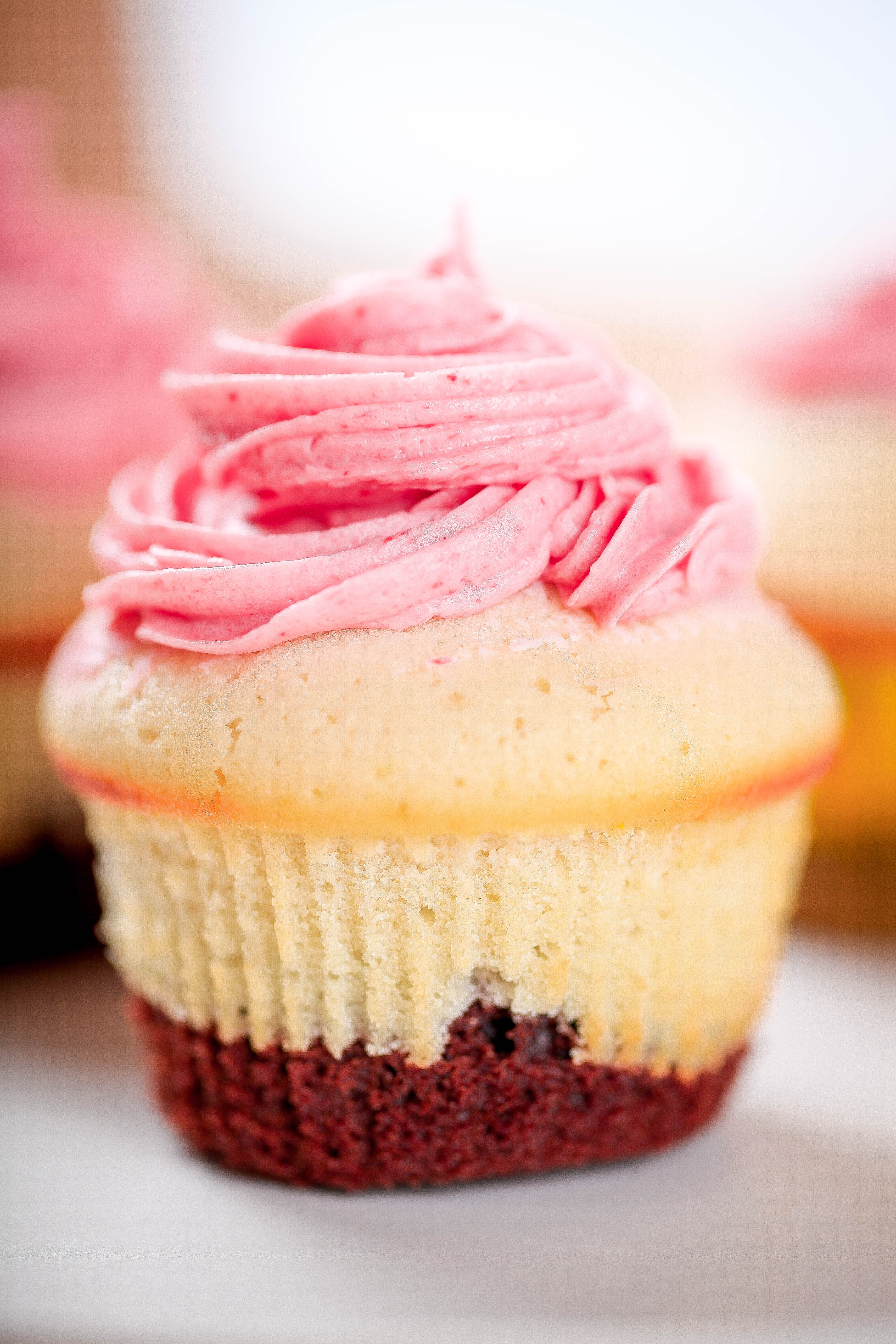 Neapolitan Cupcakes with Strawberry Buttercream Frosting