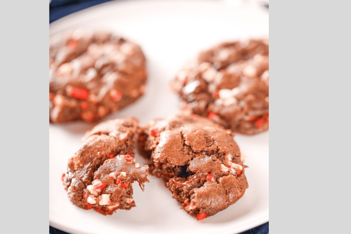 A peppermint chocolate cookie broken in half.