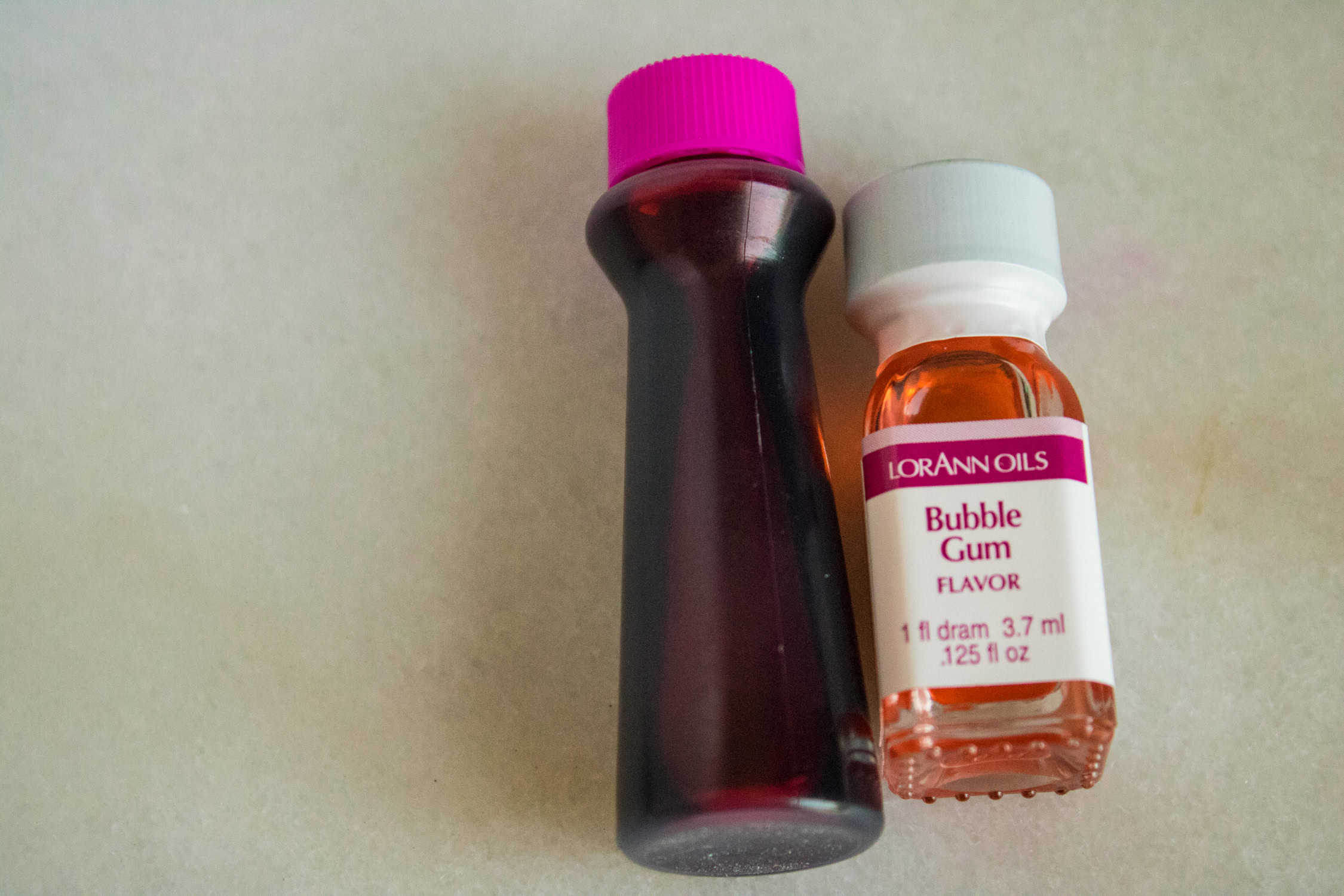 pink gel food coloring and LorAnn oils bubble gum flavor oil. 