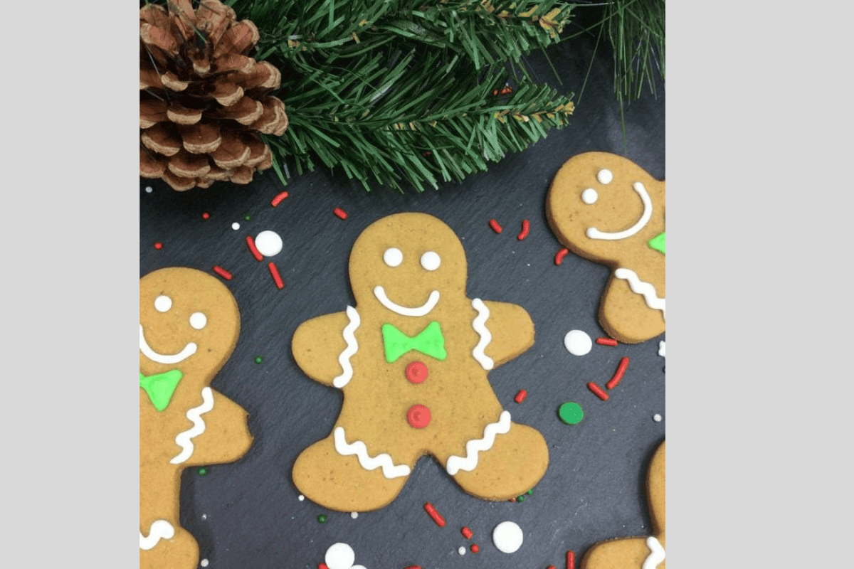 Gingerbread cookies with red buttons and green bow ties.