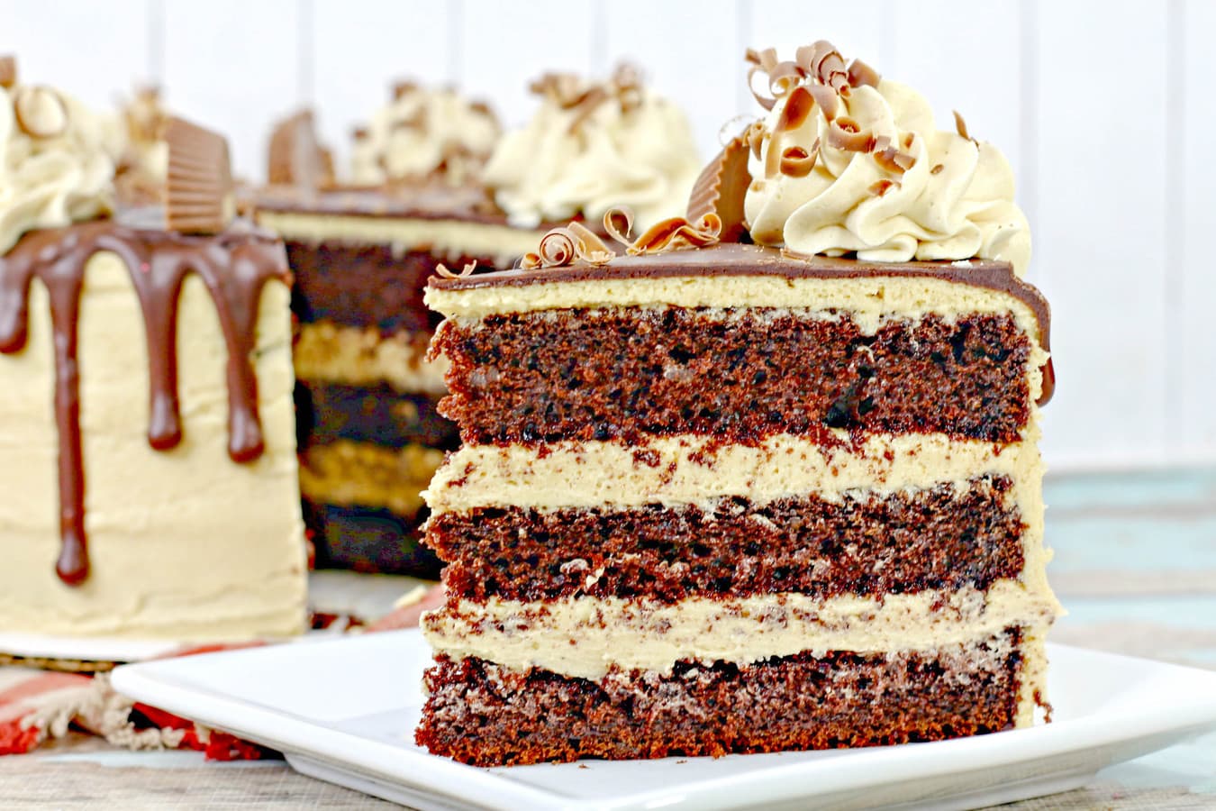 a close up of a reese's chocolate cake with peanut butter icing.