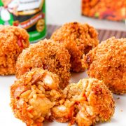 a deep fried jambalaya ball cut in half.