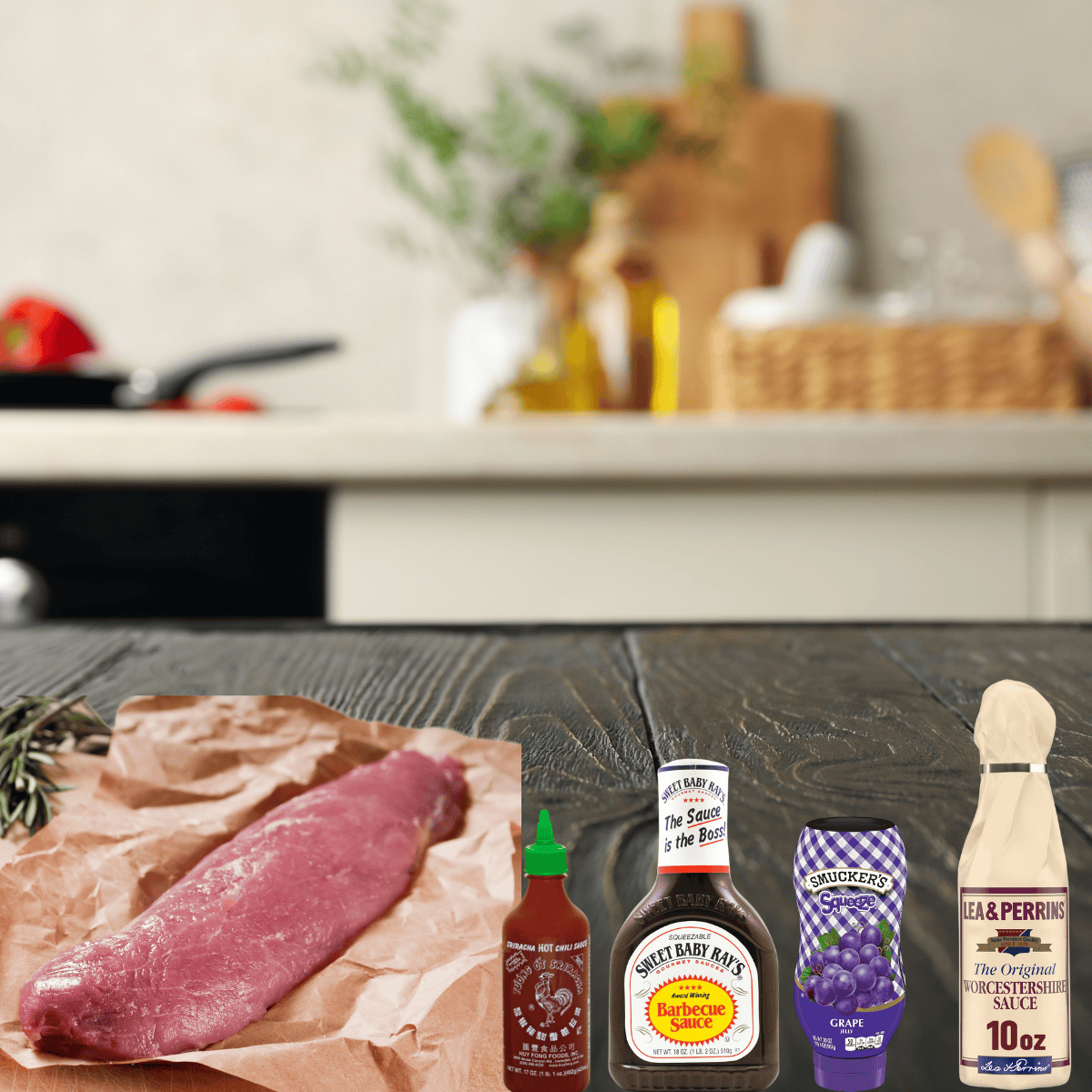 pork tenderloin, BBQ sauce, grape jelly, and other ingredients on a dark wood tabletop.