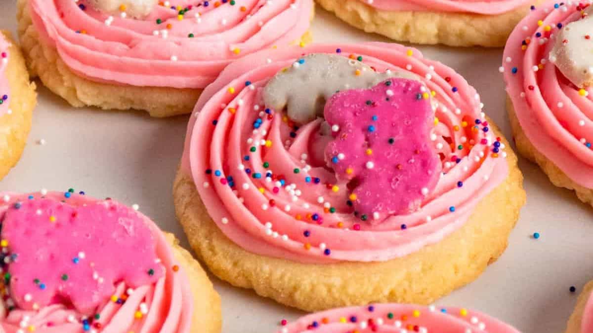 Sugar cookies with frosting and animal crackers.