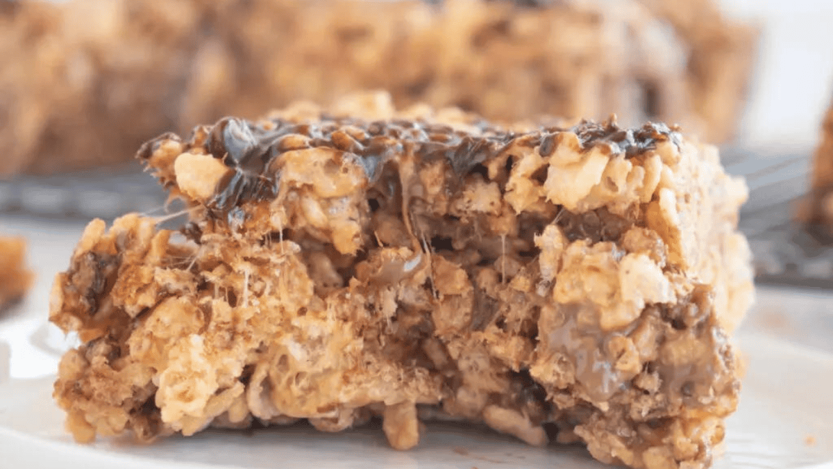 a rich fudgy rice krispie treat with peanut butter cups.

