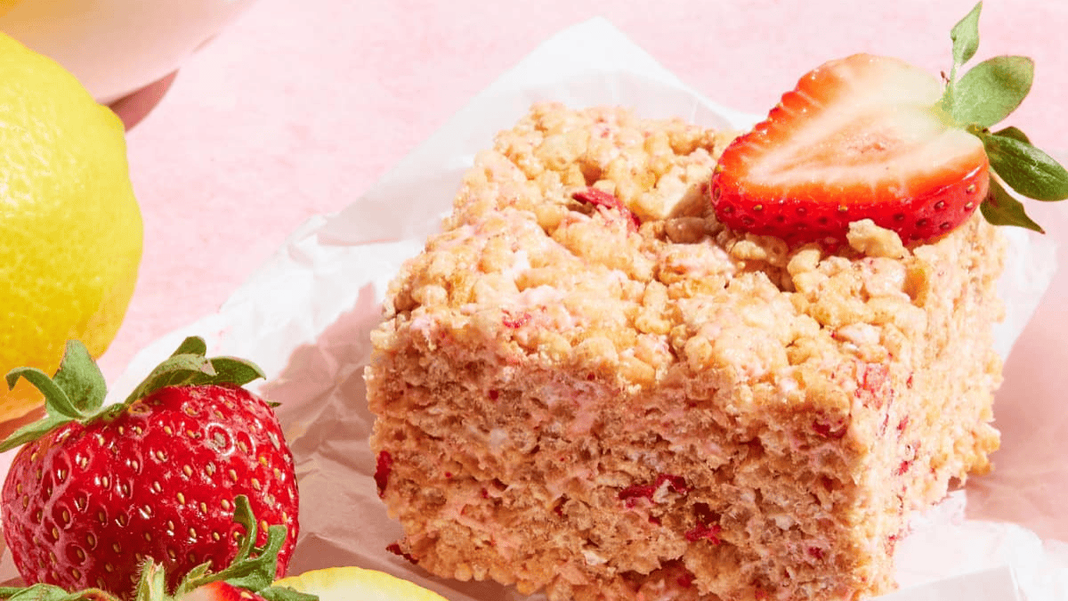 pink rice krispie treats with a berry on top.

