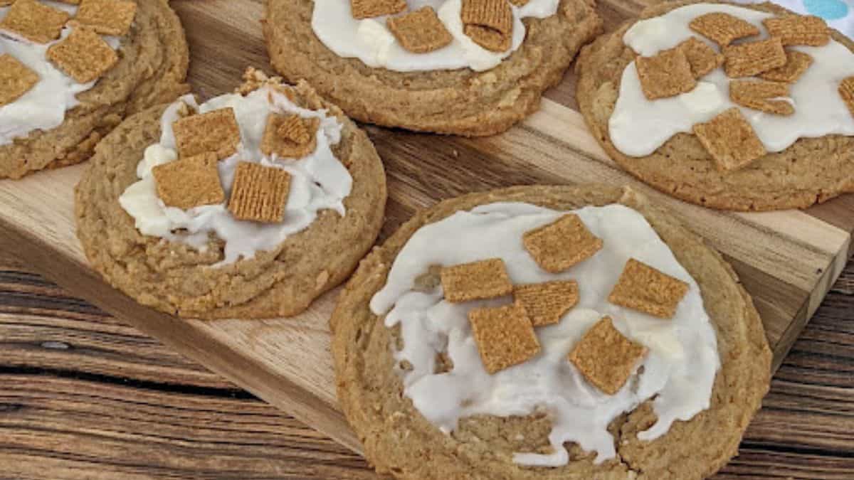 a platter of golden graham cookies, frosted with cereal on top.