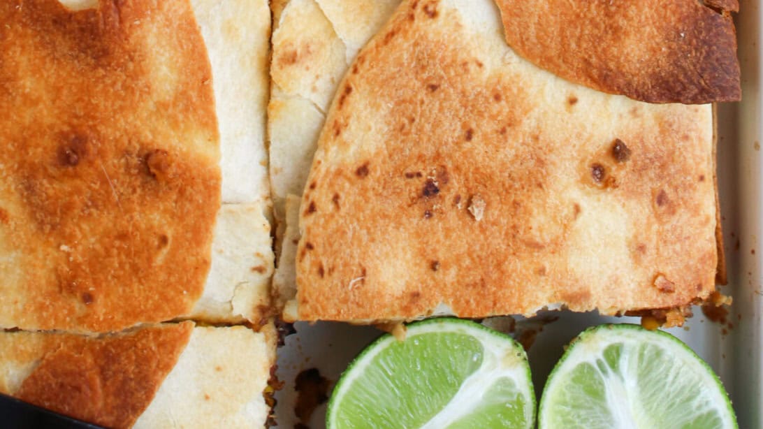 Sheet pan quesadillas baked in a sheet pan and ready to serve.