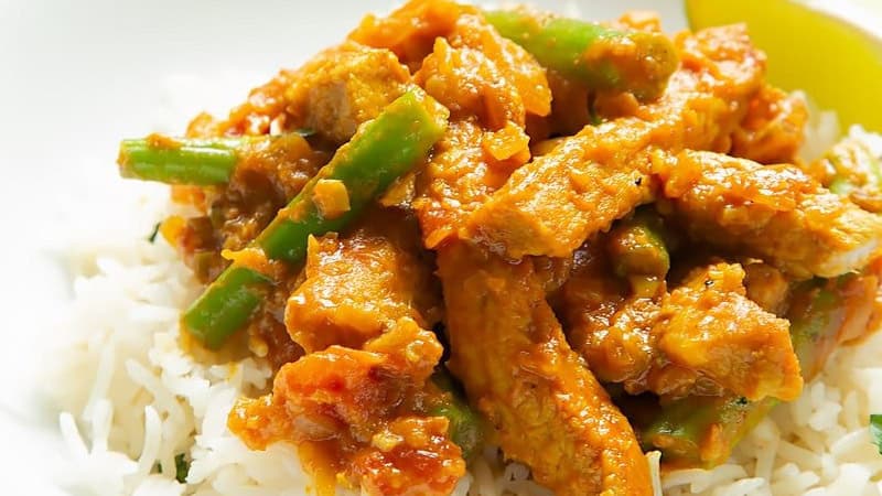 A close of up of Keralan Pandi, a South Indian coconut-pork curry.