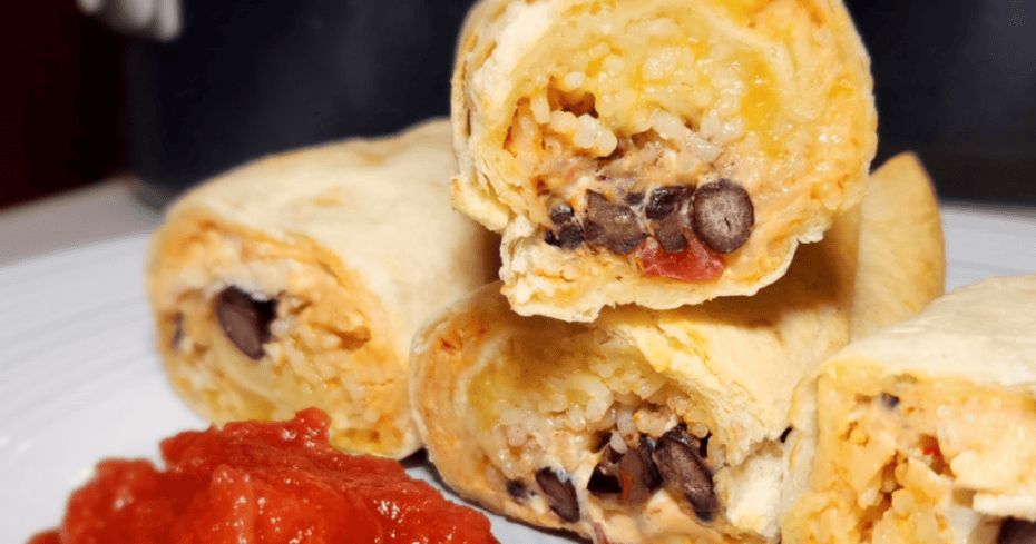 A display of Stuffed Cream Cheese Chicken Burritos.
