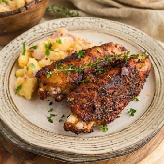 Air Fryer Turkey Wings on plate with a side.