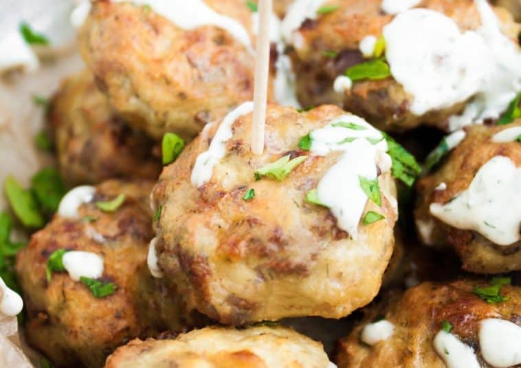 A chicken bacon ranch popper skewered by a toothpick.