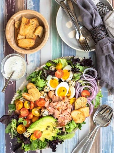 Everything bagel salad with smoked salmon, everything bagel yogurt dressing, and everything bagel chips.