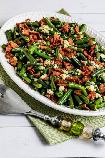 Instant Pot Green Beans with Bacon and Gorgonzola shown on serving plate.