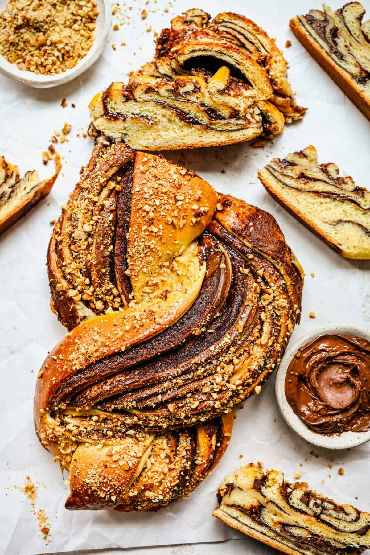 A loaf of Nutella bread with a couple slices cut.