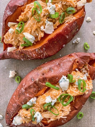 Overhead view of Slow Cooker Buffalo Chicken Stuffed Sweet Potatoes.