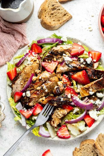 Balsamic grilled chicken salad on a plate.