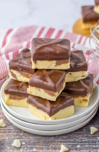 A stack of Boston Cream Pie Fudge on a white plate.