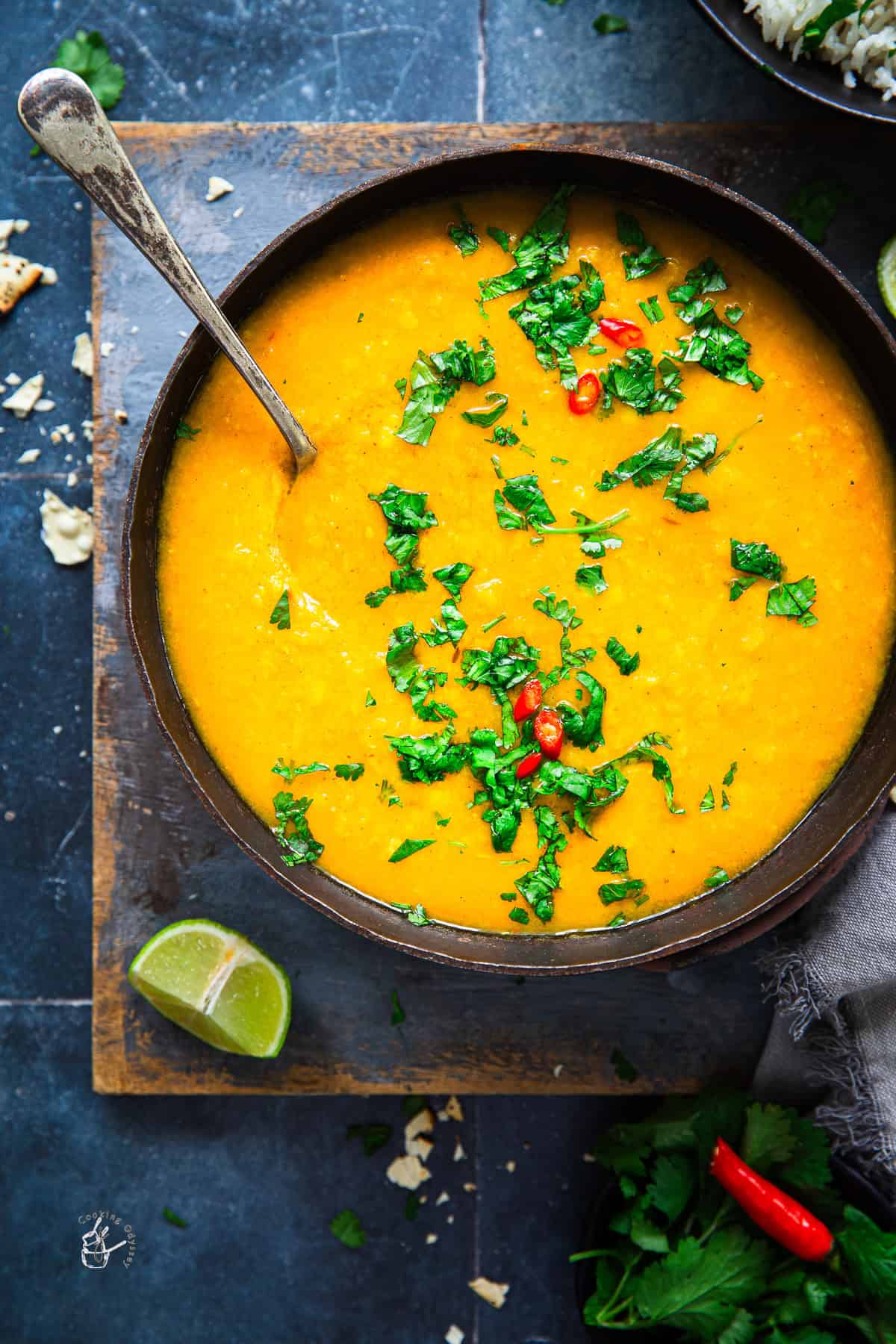 Cooked yellow masoor dal in a bowl.