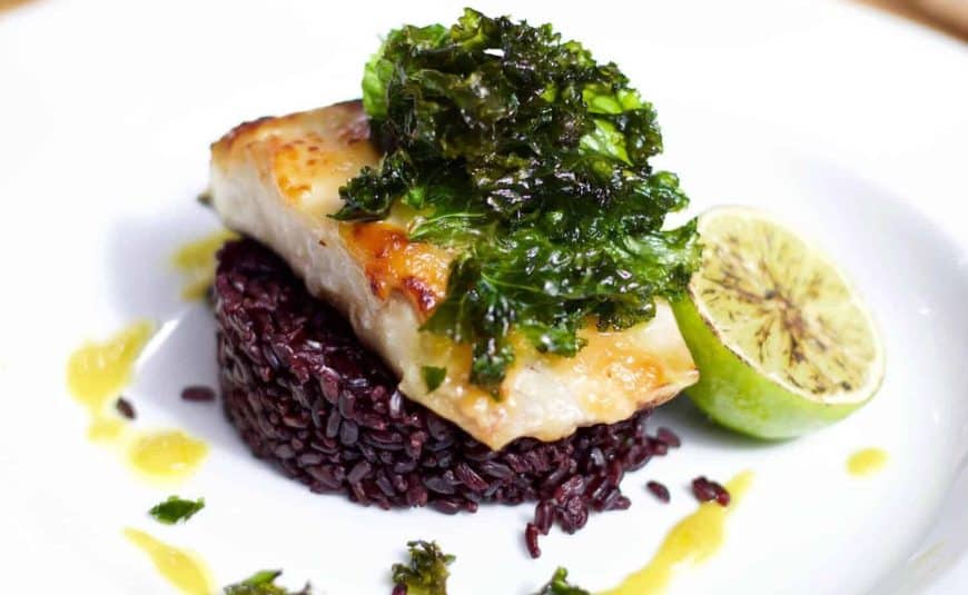 Miso cod with black pilaf rice and wasabi essence.