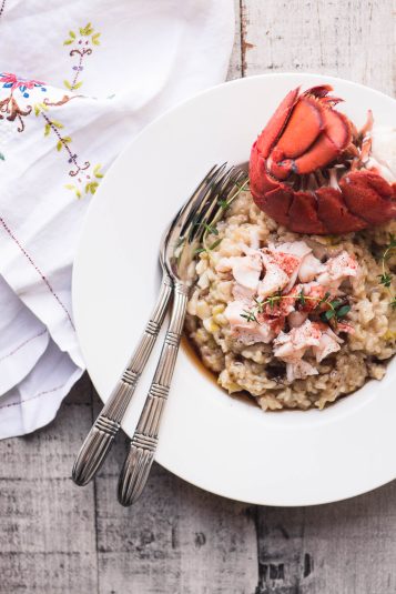 Instant Pot Lobster Risotto with forks and a napkin.