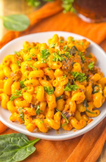 Creamy Chicken And Corn Pasta closeup partial of finished dish cropped horizontal.