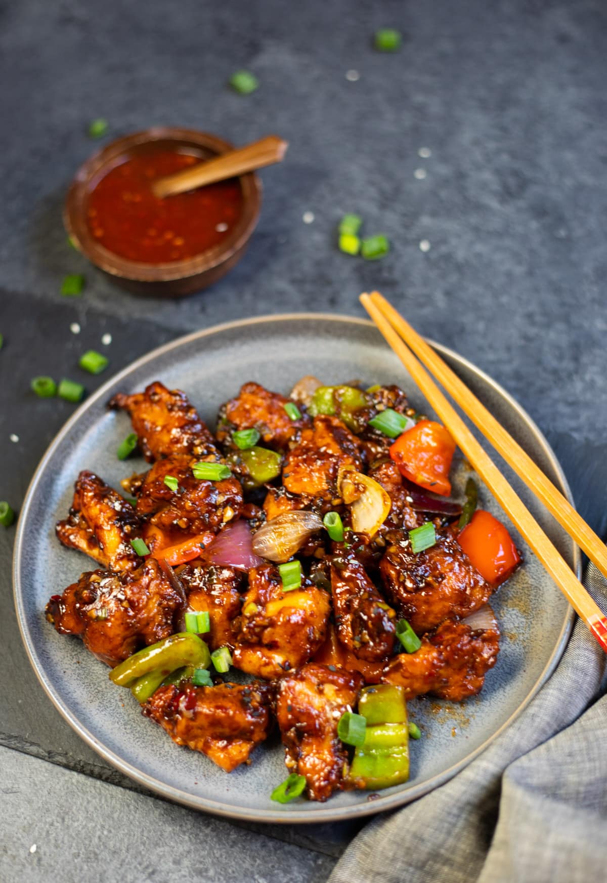 Easy Restaurant style Chilli Chicken in a plate.