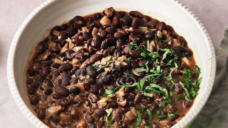 Chipotle black beans cooked and in a serving bowl.