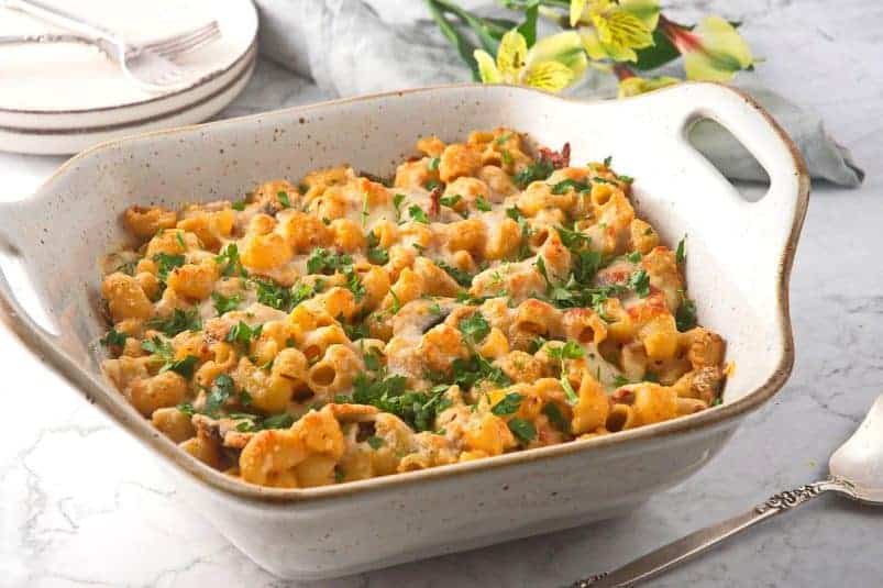 Tuna casserole in casserole dish with marble background.