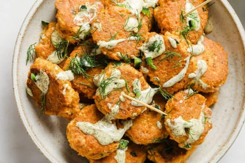 Mini spicy canned salmon patties in a serving bowl.