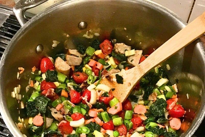 Cranberry cookies with a bite taken out of them.