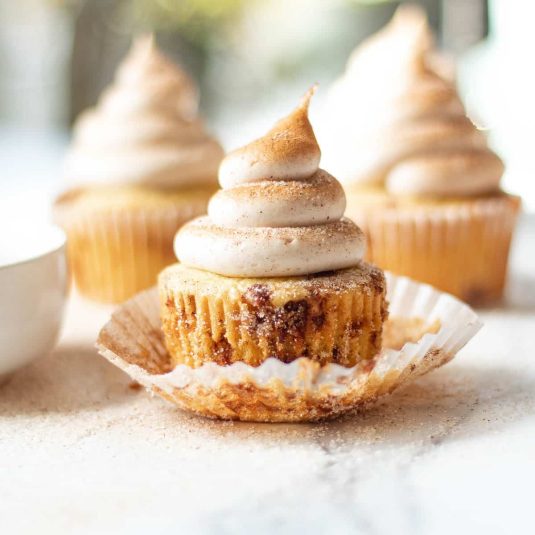 Cinnamon cupcakes on a tray.