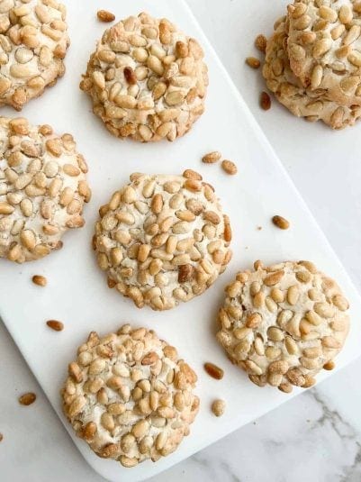 A plate of pignoli cookies.