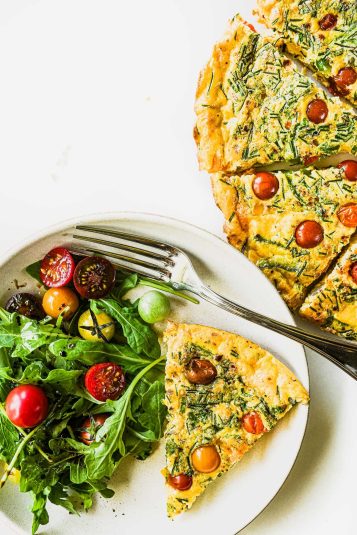A vegetable frittata with a green salad.