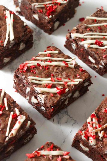 Squares of white chocolate strawberry brownies.