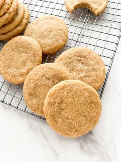 3 ingredient brown sugar cookies on a metal cooling rack.