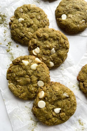 Chewy Oatmeal Matcha Cookies on parchment paper.
