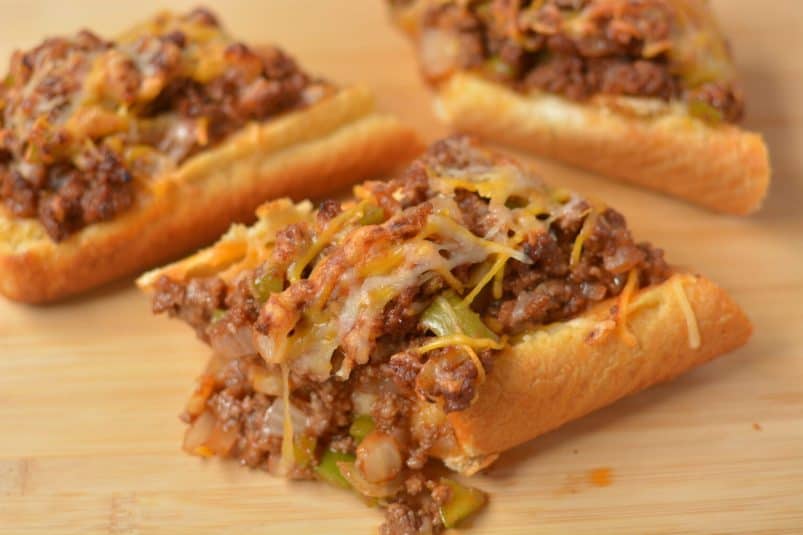 A slice of garlic bread sloppy joes.