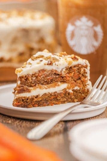A slice of carrot cake served on a plate.