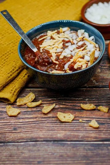 Bowl of Texas Style Chili served with corn chips.