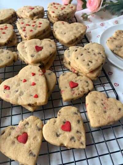 Earl Gray scones stacked on a white plate.
