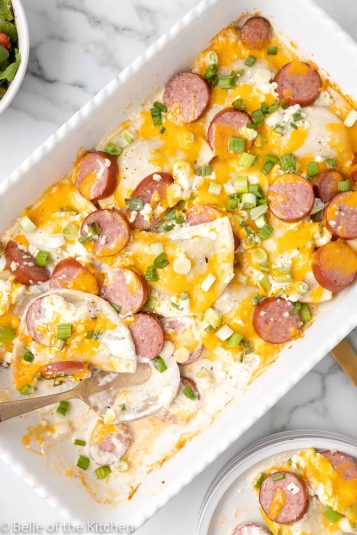 Pierogies and sausage in a casserole dish.