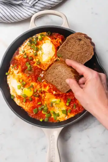 Overhead view of Spicy Eggs and Tomato.