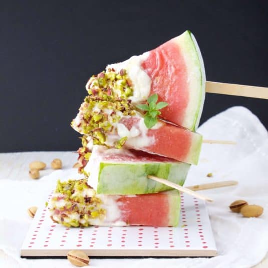 A stack of Watermelon & Yogurt Popsicles.