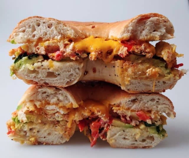 A stack of Avocado & Veggie Breakfast Sandwiches.