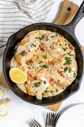 Cheesy mexican meatballs in a skillet.