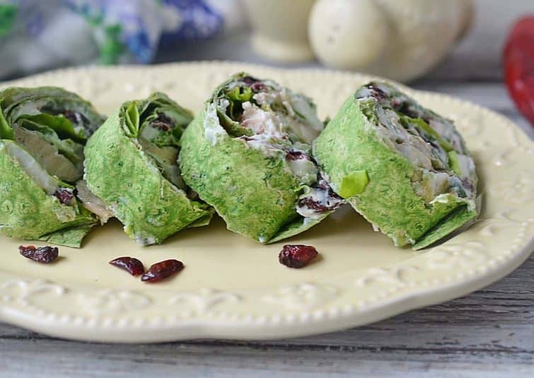 Turkey Cranberry Pinwheel Wraps on a white plate.