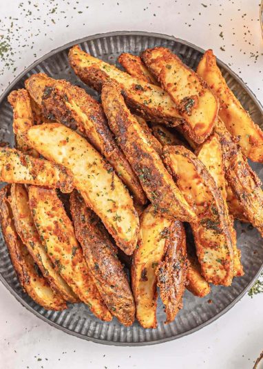 Baked Potato Wedges on a plate.