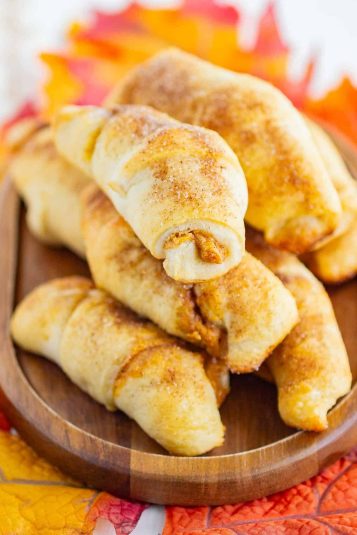 Crescent rolls piled on top of each other.
