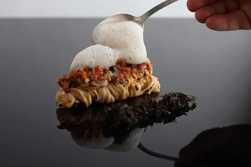 A display of Lobster Bolognese with Brown Butter Truffle Sauce.